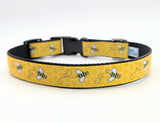 Medium dog collar with bumblebee patterned ribbon sewn onto sturdy webbing backing