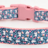 Handmade Spring Bunny Floral dog collar featuring white rabbits and flowers on a dark turquoise background with a side-release buckle.