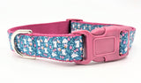 Handmade Spring Bunny Floral dog collar featuring white rabbits and flowers on a dark turquoise background with a side-release buckle.