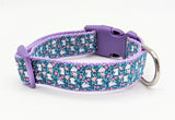Handmade Spring Bunny Floral dog collar featuring white rabbits and flowers on a dark turquoise background with a side-release buckle.