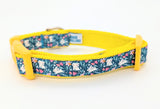 Handmade Spring Bunny Floral dog collar featuring white rabbits and flowers on a dark turquoise background with a side-release buckle.