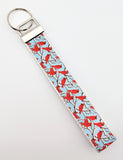 Winter Cardinal key fob showing the cardinal bird pattern.