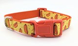 Wide large dog collar in yellow hotdog pattern ribbon with red accent detailing and heavy-duty hardware