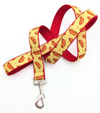 Matching dog leash featuring yellow hotdog and red accent ribbon with a heavy-duty swivel bolt snap hook