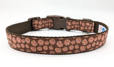 Medium candy cookie dog collar in 1" width brown nylon and brown plastic hardware. Including a white label inside with Rogue Collars logo on it.