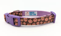 XS candy cookie dog collar in 5/8" width lavender nylon and purple plastic hardware. Including a white label inside with Rogue Collars logo on it.